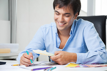 Image showing Interior Designer With Color Swatches