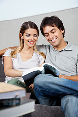 Image showing Couple Reading Book