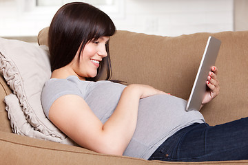 Image showing Happy Pregnant Woman with Digital Tablet