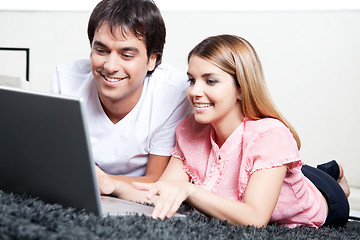 Image showing Young Couple Using Laptop