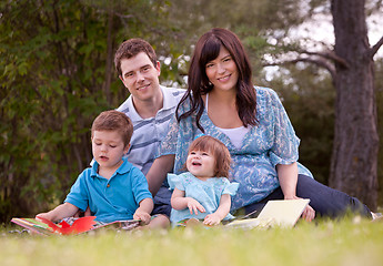 Image showing Family Reading in Park