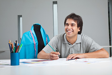 Image showing Happy Clothing Designer At Work