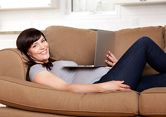 Image showing Relaxed Pregnant Woman with Computer