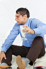 Image showing Geek Holding Healthy Drink