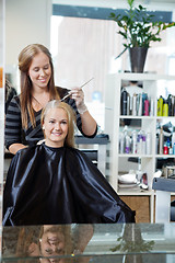 Image showing Woman Getting Hair Highlighted