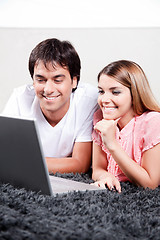 Image showing Young Couple Using Laptop