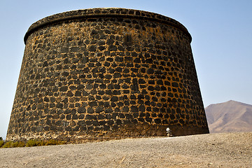 Image showing hill lanzarote  spain the old wall castle  tower and door  in te