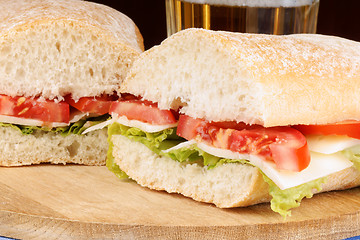 Image showing Italian panino sandwich and beer