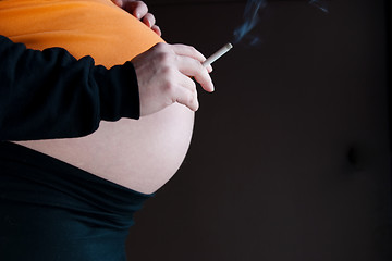 Image showing Woman pregnant smoking