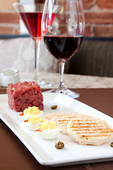 Image showing Ontario Bison Tartare served with Red Wine