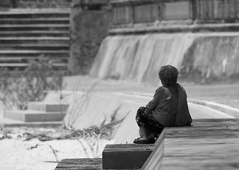 Image showing Old woman waiting