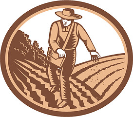 Image showing Organic Farmer Sowing Seed Woodcut Retro