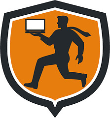 Image showing Computer Technician Carrying Laptop Running Shield