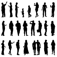 Image showing Black silhouettes of beautiful mans and womans on white backgrou