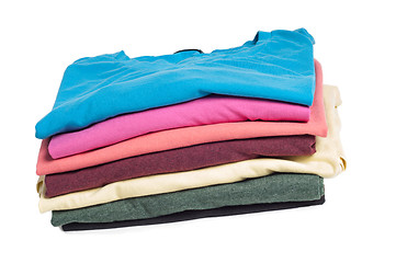 Image showing Multicolored clothes in pile