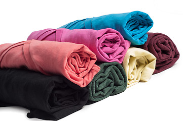 Image showing Rolls of multicolored clothes