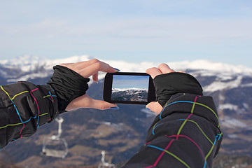 Image showing Photographing winter landscape use cell phone