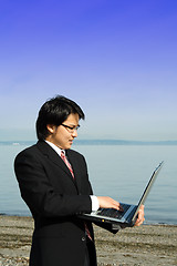 Image showing Working businessman