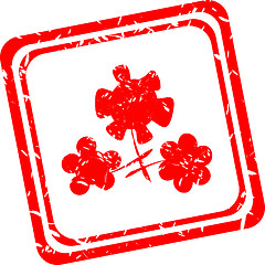 Image showing flower symbol on red grunge web stamp