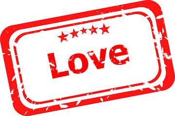 Image showing Red grunge rubber stamp with the word love written inside the stamp