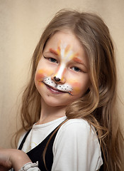 Image showing little girl with cat painting makeup portrait