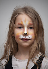 Image showing little girl with cat painting makeup portrait