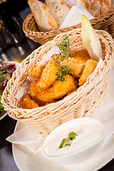 Image showing Crumbed chicken nuggets in a basket