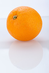 Image showing Fresh orange halved to show the pulp