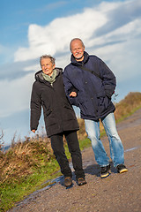 Image showing happy mature couple relaxing baltic sea dunes 