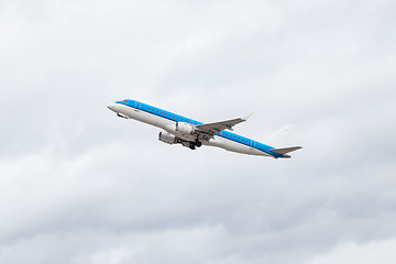 Image showing Commercial airliner flying midair after takeoff