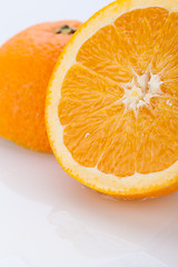 Image showing Fresh orange halved to show the pulp