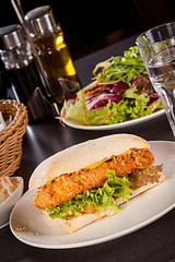 Image showing Burger with golden crumbed chicken breast