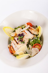 Image showing tasty fresh caesar salad with grilled chicken and parmesan 