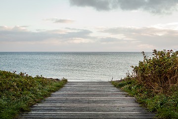 Image showing Bridge or pier across an expanse of sea