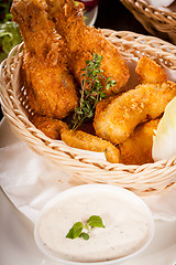 Image showing Crisp crunchy golden chicken legs and wings