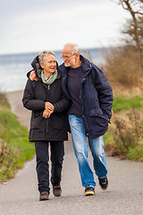 Image showing happy mature couple relaxing baltic sea dunes 