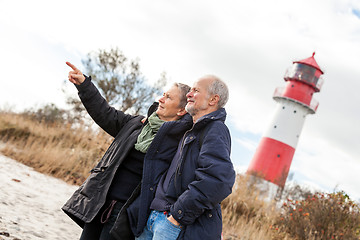 Image showing happy mature couple relaxing baltic sea dunes 