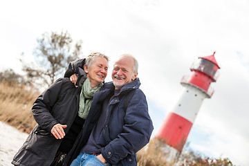 Image showing happy mature couple relaxing baltic sea dunes 