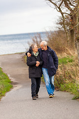 Image showing happy mature couple relaxing baltic sea dunes 