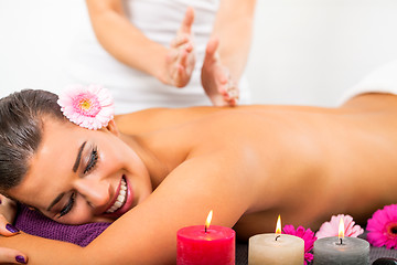 Image showing Beautiful woman having a back massage