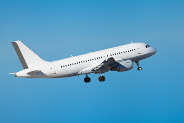 Image showing Commercial airliner flying midair after takeoff