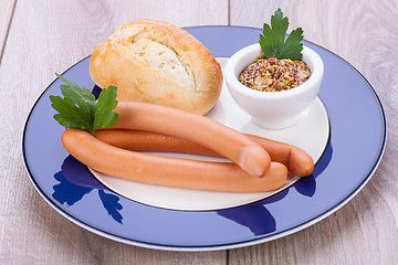 Image showing tasty sausages frankfurter with grain bread 