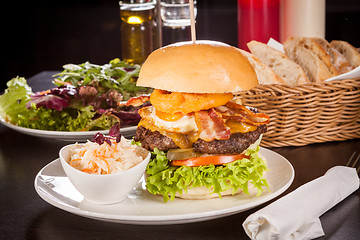 Image showing Delicious egg and bacon cheeseburger