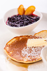 Image showing tasty sweet pancakes with vanilla icecream and topping