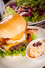 Image showing Delicious egg and bacon cheeseburger