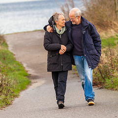 Image showing happy mature couple relaxing baltic sea dunes 