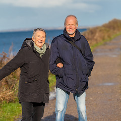 Image showing happy mature couple relaxing baltic sea dunes 