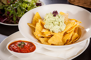 Image showing Crisp corn nachos with guacamole sauce