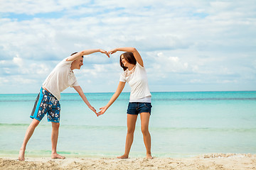 Image showing smiling young couple having fun in summer holiday