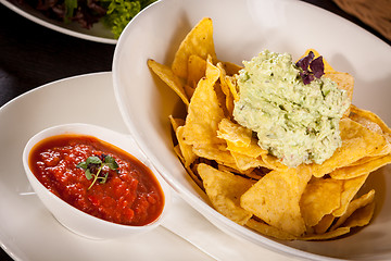 Image showing Crisp corn nachos with guacamole sauce